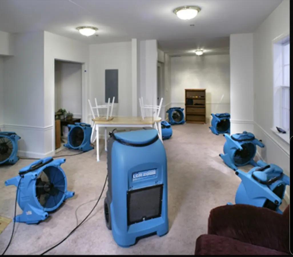 Air movers and dehumidifier setup for Water Damage Restoration in Auburn